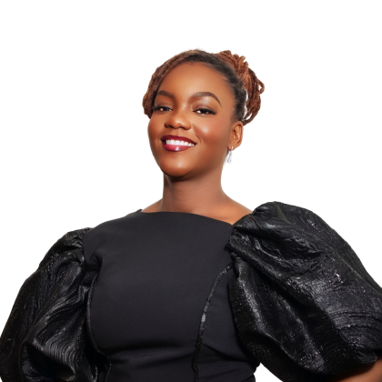 Dr Vimbai Maiwasha smiles at the camera. She is wearing a black dress with puffy sleeves